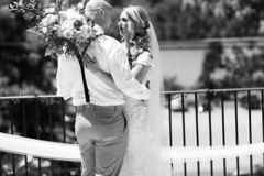 Black-and-white-photo-of-bride-looking-at-groom