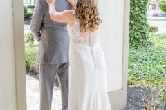 Bridge-touching-the-shoulders-of-the-groom