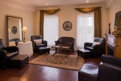 Reception-room-with-brown-leather-seating