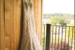 Wedding-dress-on-hanger-on-the-patio