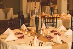 Wedding-table-place-setting-with-red-accents